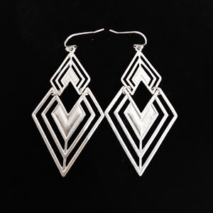Beautiful art deco style silver colored fashion earrings